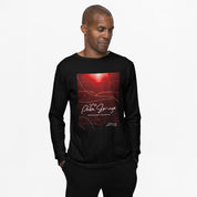 Man wearing a black long-sleeve shirt with a red graphic design on a white background