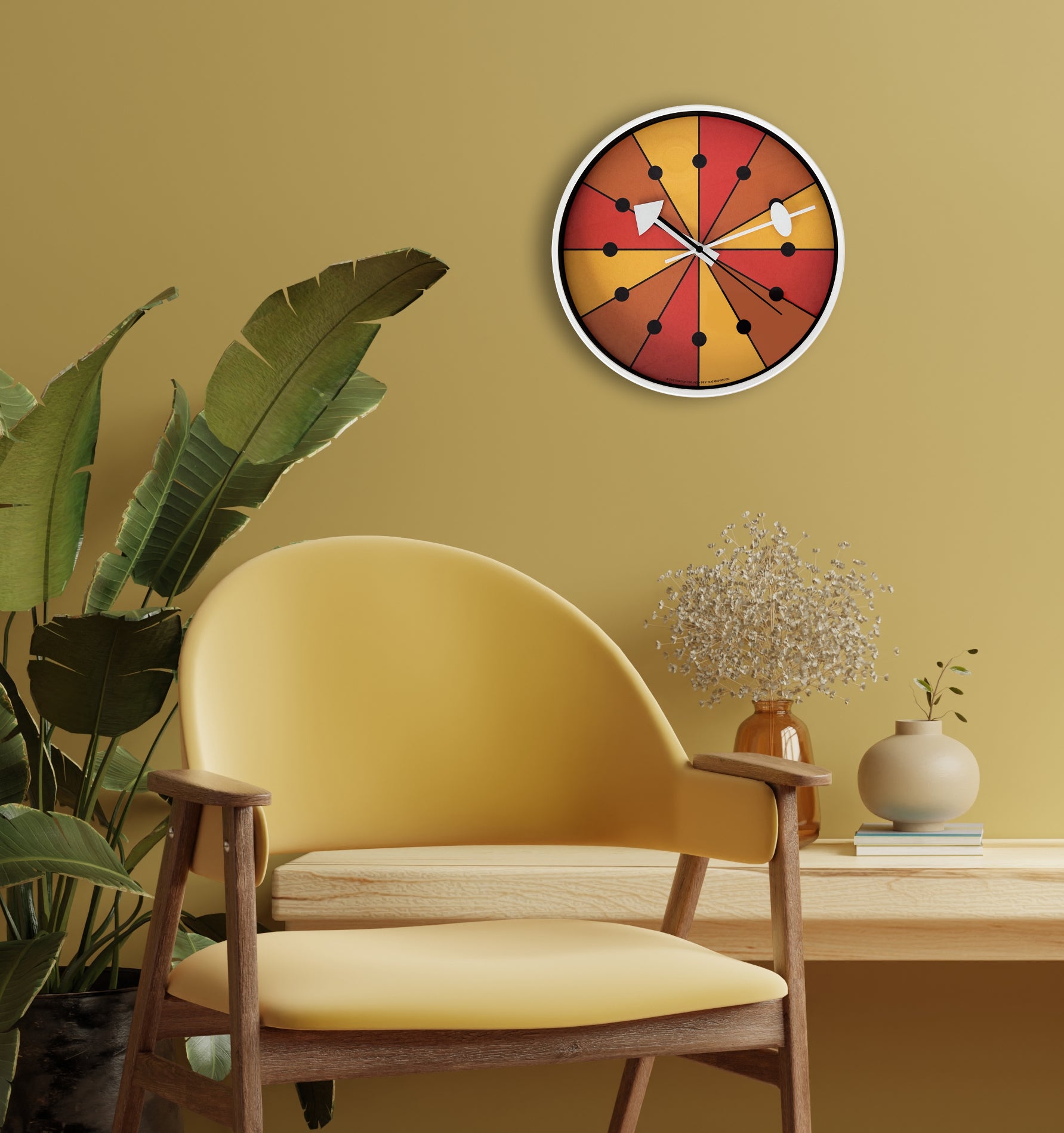 mod orange yellow and red wall clock with white hands and rim hanging on green wall with yellow midcentury chair