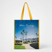 Tote bag with Palm Springs California design featuring palm trees and a car.
