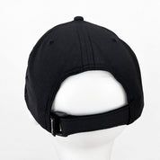 Rear view of a black baseball cap displayed on a white mannequin head against a plain white background.