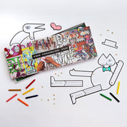 Coloring toy set with coloring book, crayons, and cut-out shapes on a white background