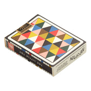 Colorful geometric-patterned box with text on a white background