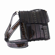 Black film strip handbag on a white background