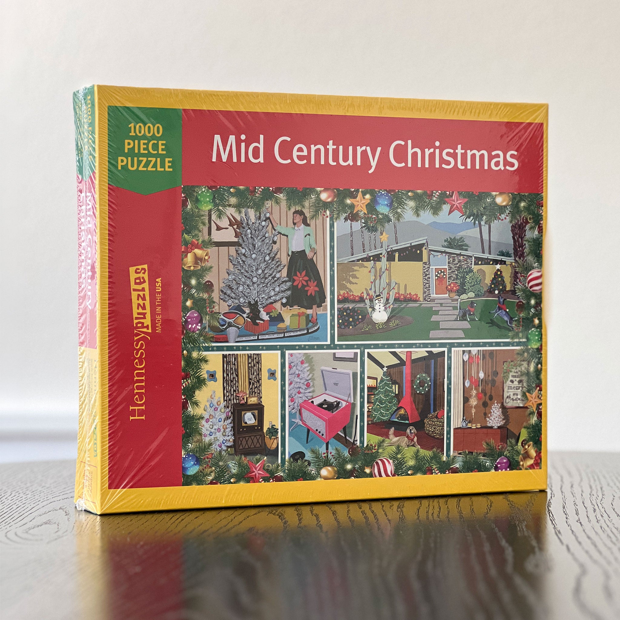 Jigsaw puzzle box titled 'Mid Century Christmas' with colorful illustrations on a white background