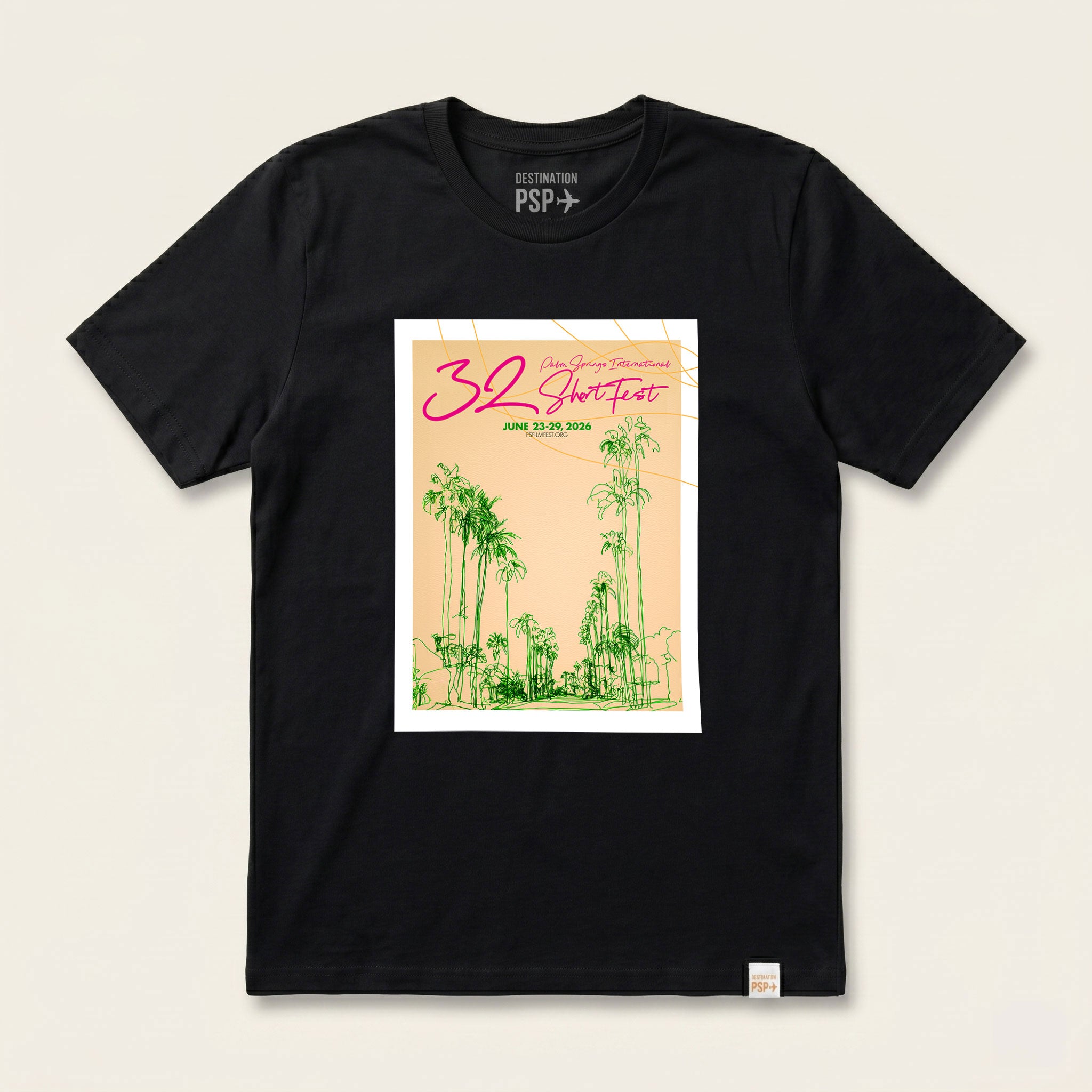 Black t-shirt with a graphic design on a beige background